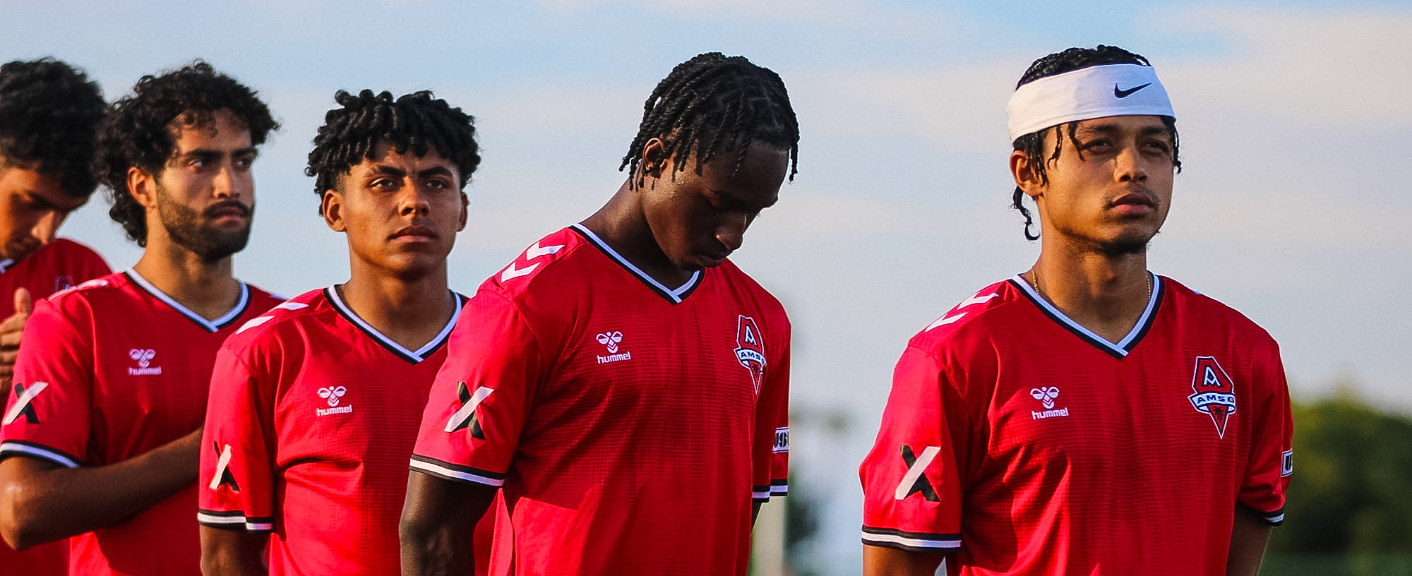 AMSG men's team in red kits