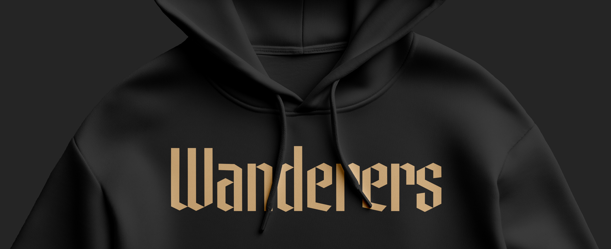 Wanderers gold lettering on black hoodie